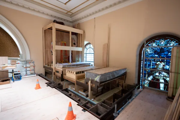Timber organ components crated and braced inside St James' Church during the organ installation