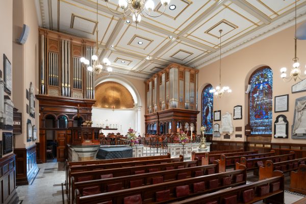 The nave of St James' Church from the gallery, with the Bicentennial Pipe Organ cases either side of the sanctuary